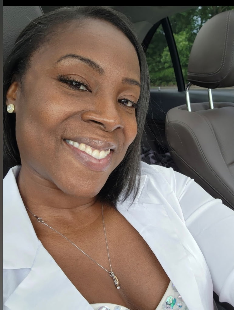 La'Aura Deluxe smiling, Chicago Minded birthday tribute to the Lansing IL event venue entrepreneur