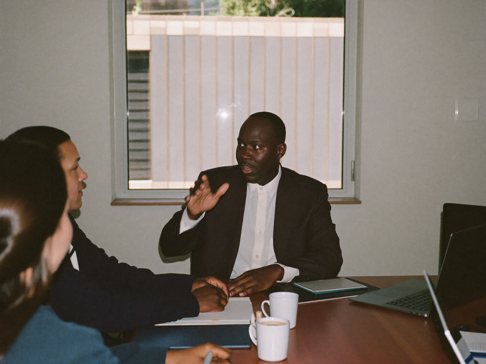 Black businessman making his point in a meeting
