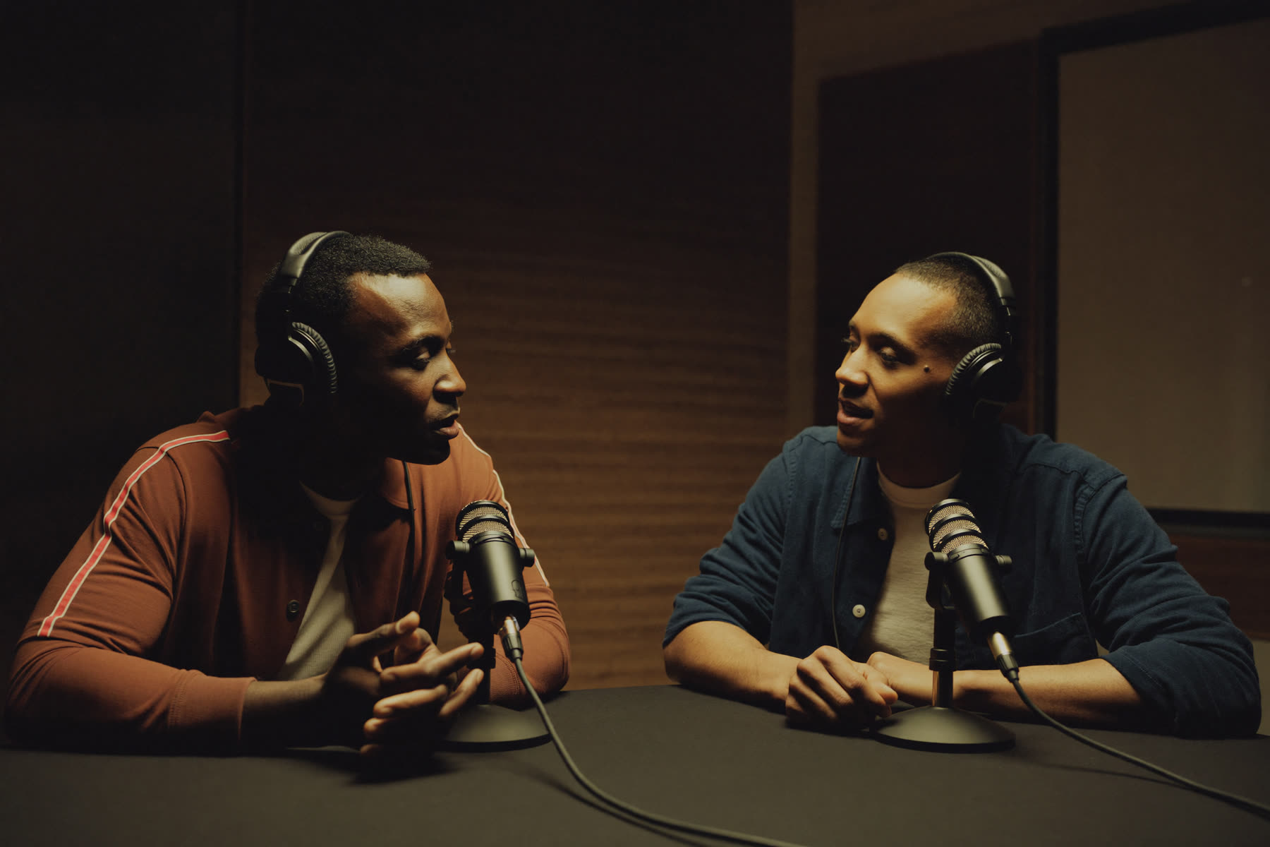 Two men recording a podcast conversation together