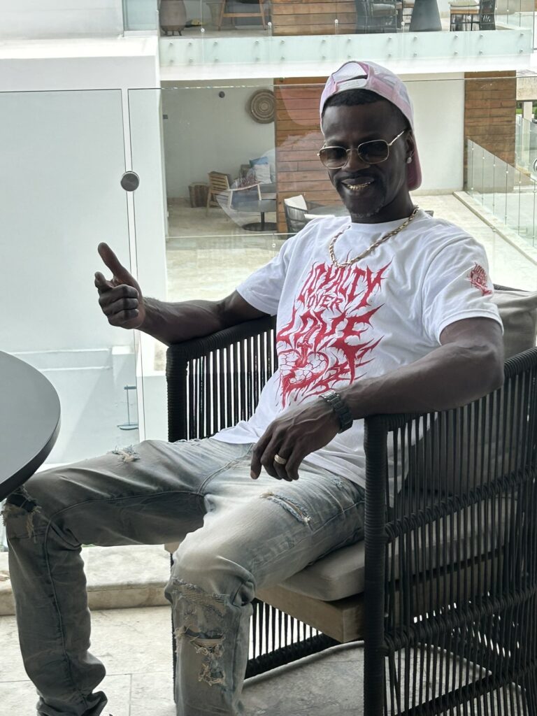 David Hawkins seated at a resort in San Pedro, Belize